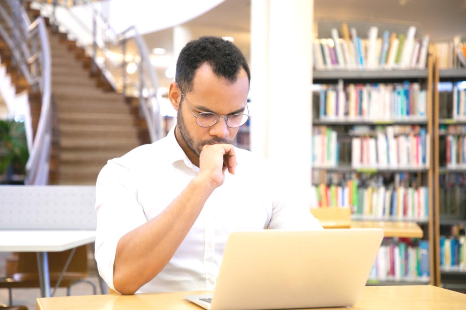 Financial planning workspace with multiple scenario projections displayed on screens